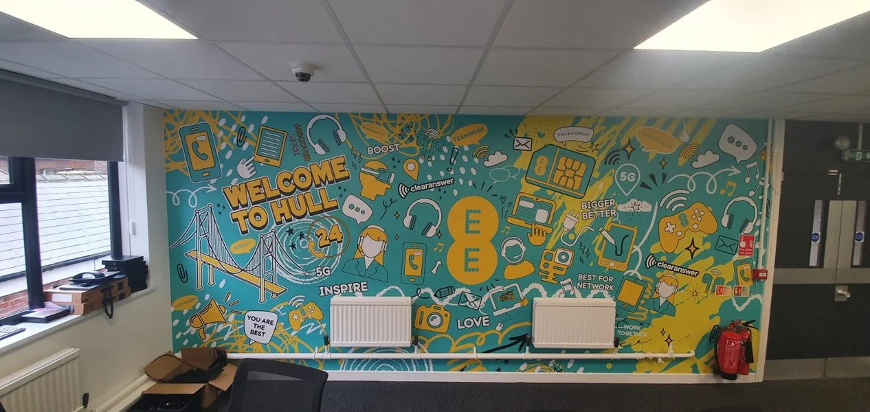 An image of the yellow and teal "Welcome to Hull" wall graphic.